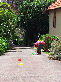 golfing on driveway